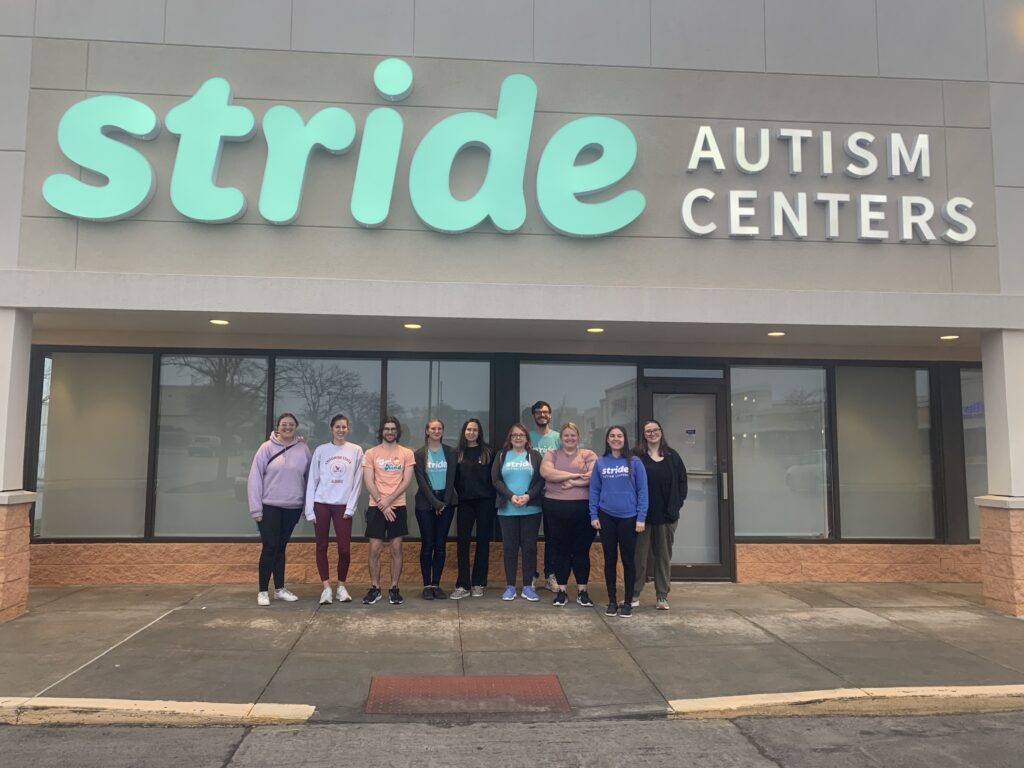 Stride team posing in front of the Stride Center in Nebraska.